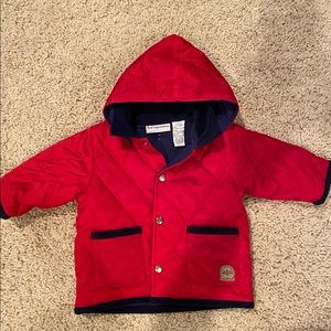 First impressions quilted jacket with detachable hood. New without tags